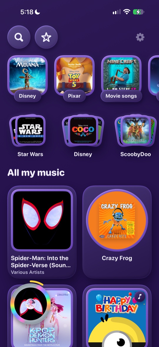 The home screen with the player bubble spinning in the corner while the music plays